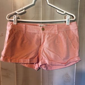Orange and white stripped American eagle shorts